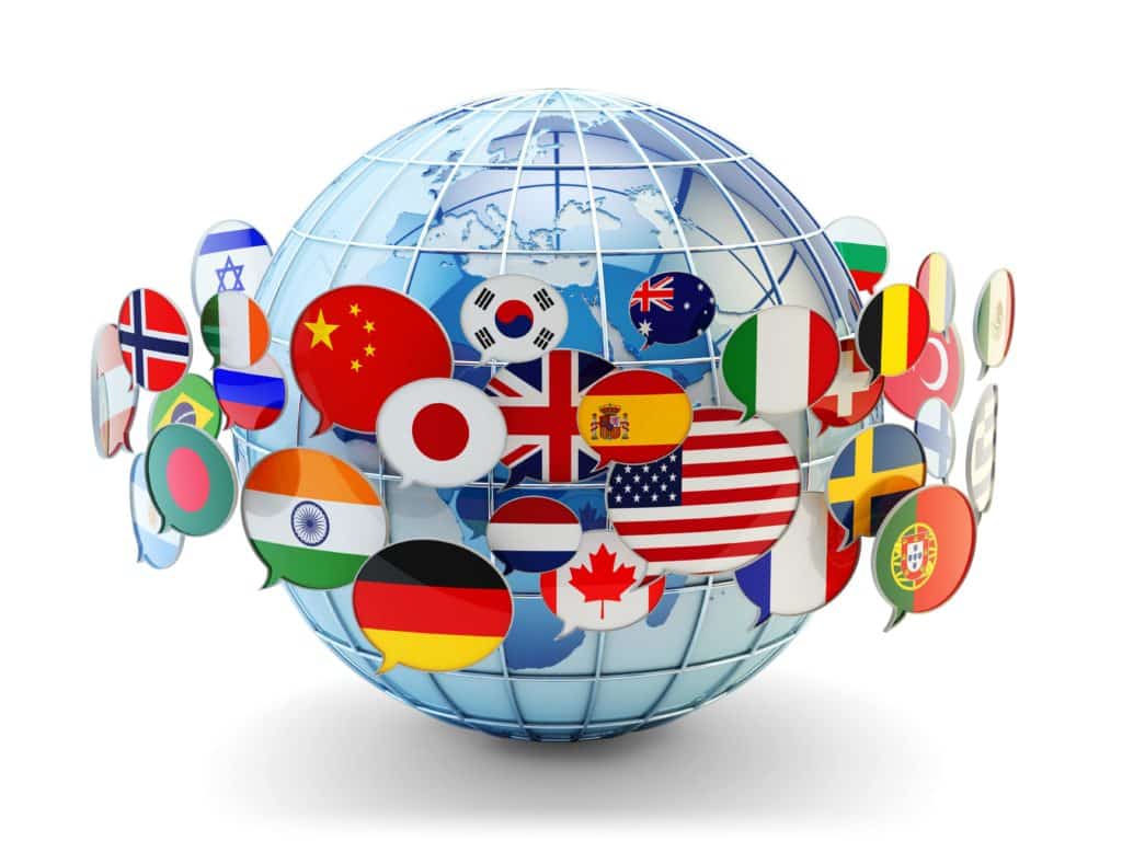 Globe représentant le monde avec plusieurs drapeaux représentés.